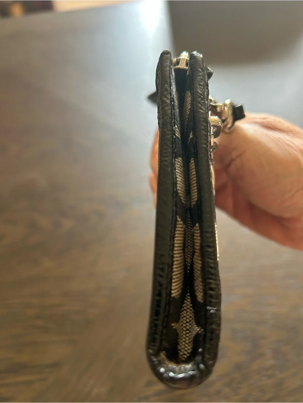 Coach Poppy Black and Cream Signature Wristlet